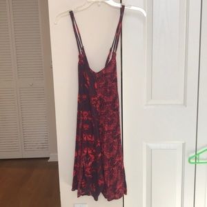 Free people- cross strap romper. Never worn